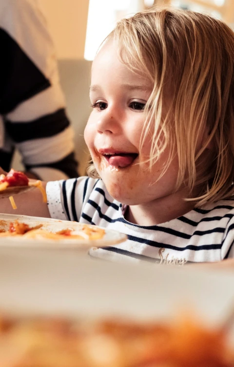 Child eating at a table