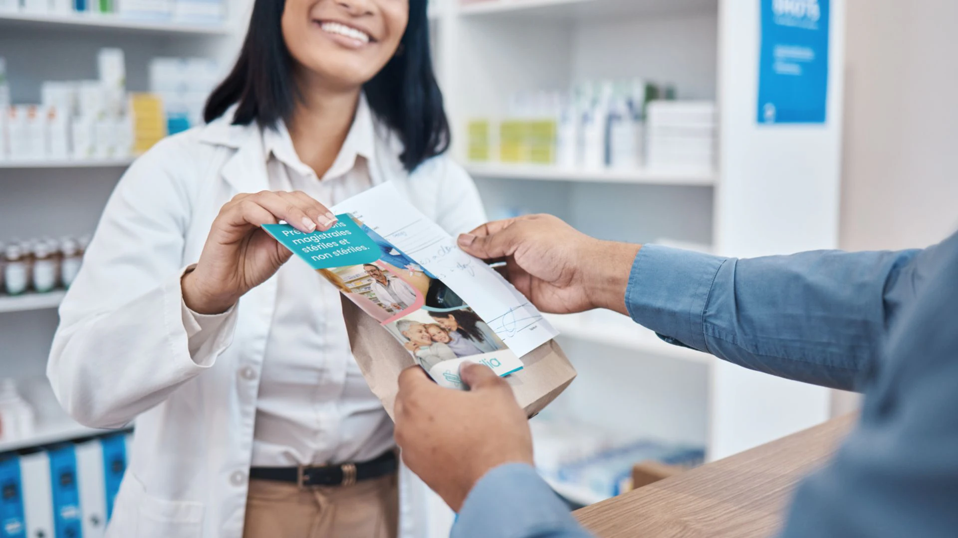 A pharmacist sharing Sterilia’s patient information brochure